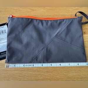 Arc’teryx Rebird pouch with orange zipper